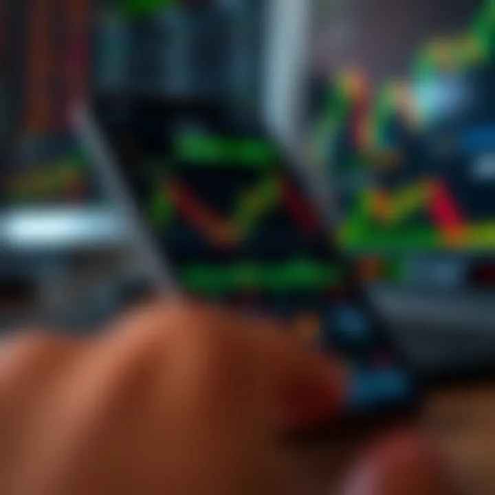 Mobile device displaying forex trading application interface with currency exchange charts and data